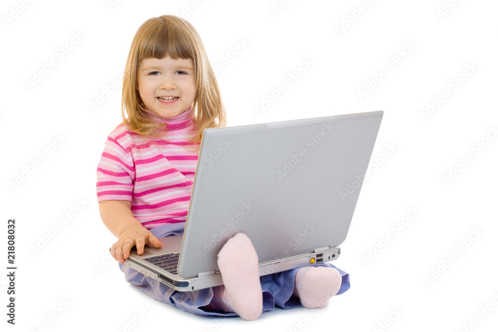 Little smiling girl with laptop Little smiling girl with laptop