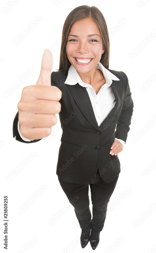 Woman giving thumbs up to the camera Woman giving thumbs up to the camera