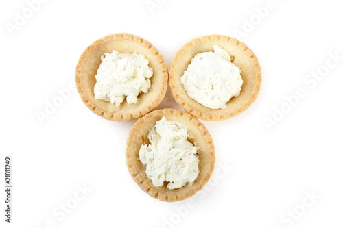 Tartlets with soft cheese isolated
