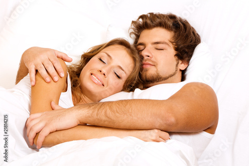 Young beautiful couple sleeping
