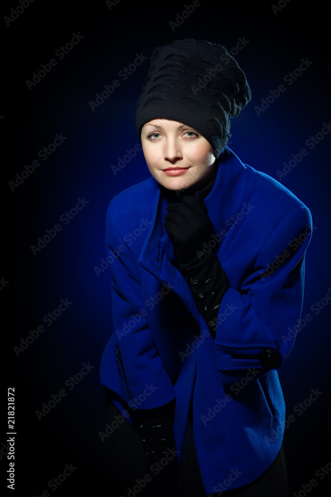 Lady in a blue topcoat