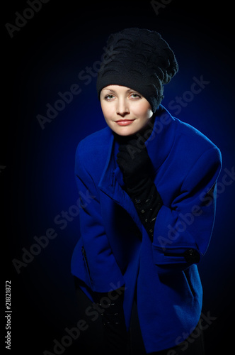 Lady in a blue topcoat