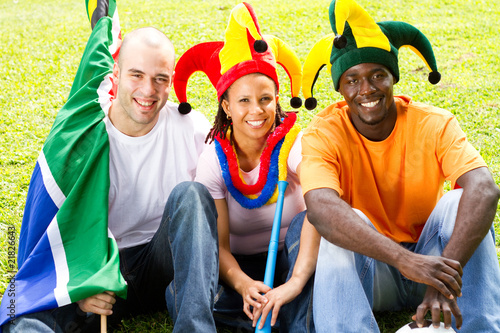 young south african sports fans on field