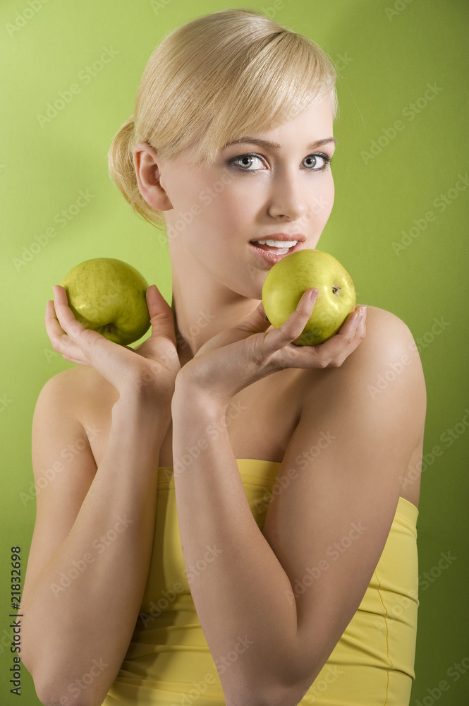 blond woman with green apple