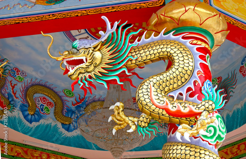 Colorful China dragon on oriental temple roof