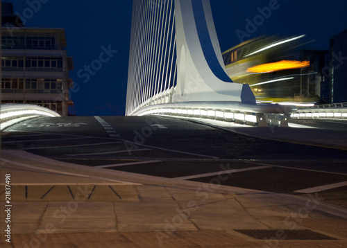 Dublin City Bus on White suspension bridge at night