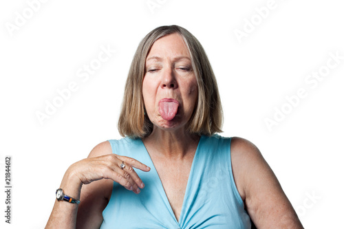 Older woman sticking out her tongue