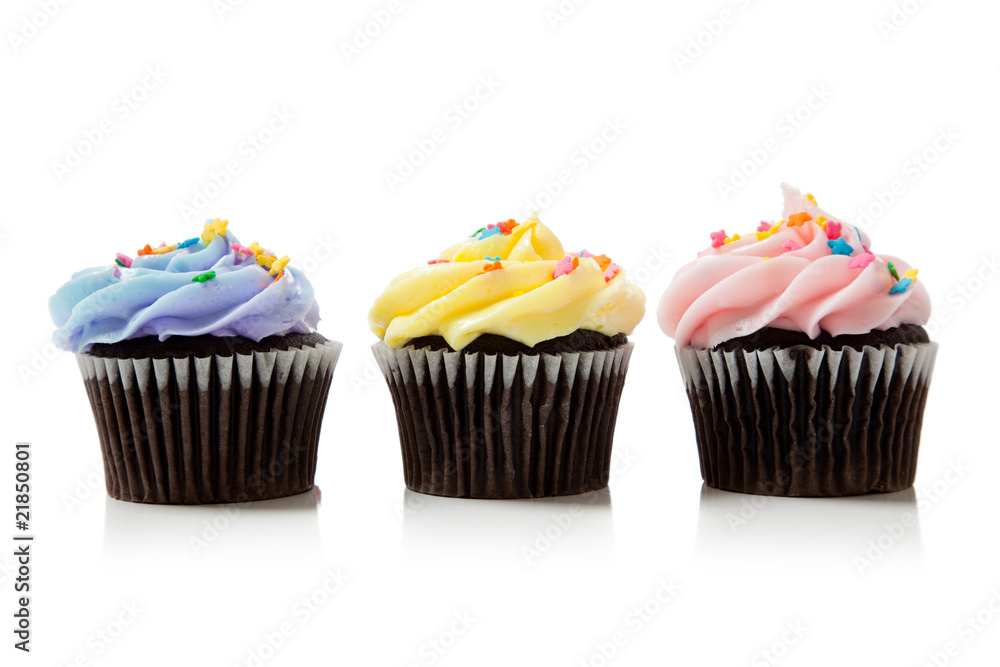 Pastel chocolate cupcakes on white Pastel chocolate cupcakes on white