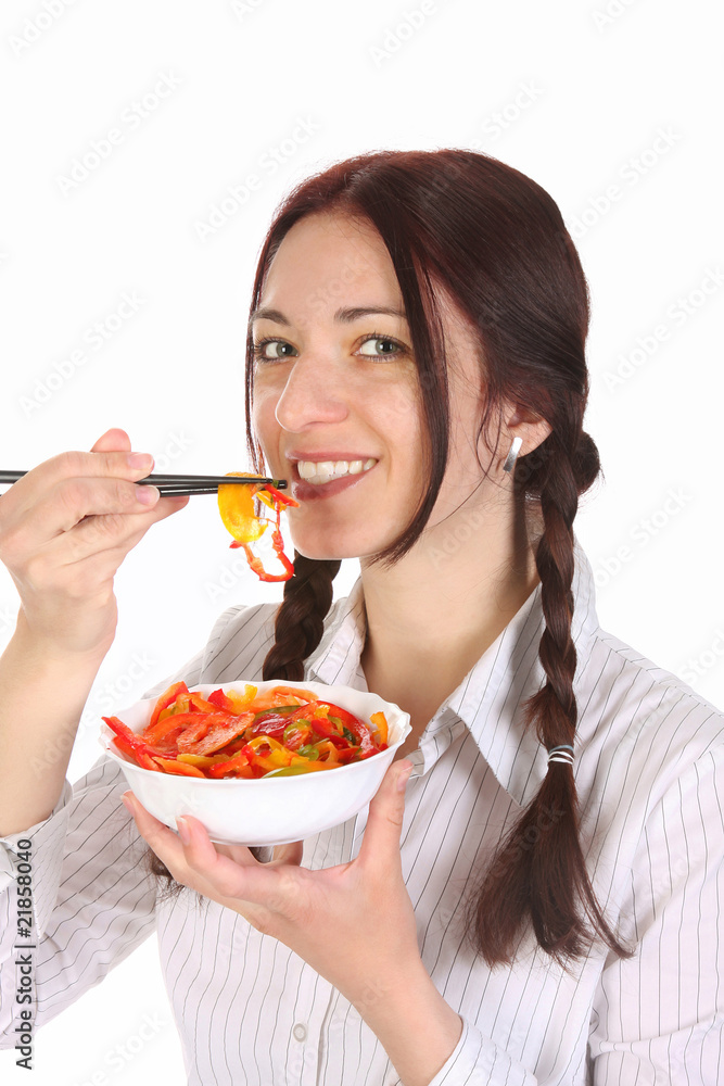 Beautiful woman eating with chopsticks