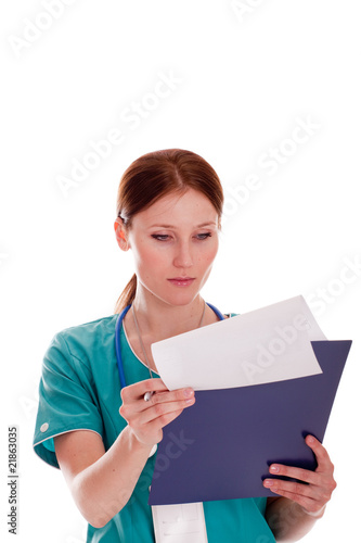 Medic looking at her report