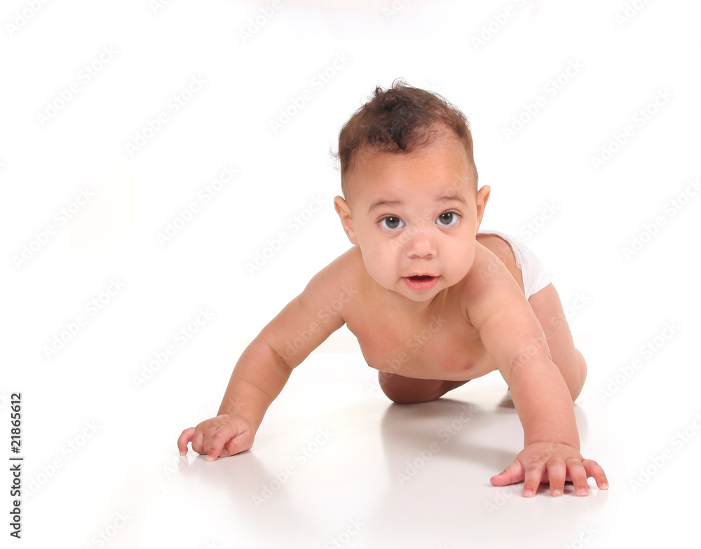 Infant Baby Boy Learning to Crawl on White Infant Baby Boy Learning to Crawl on White