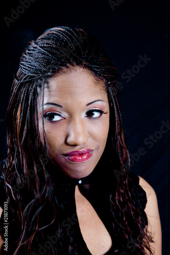 Pretty african american woman with doubtful look