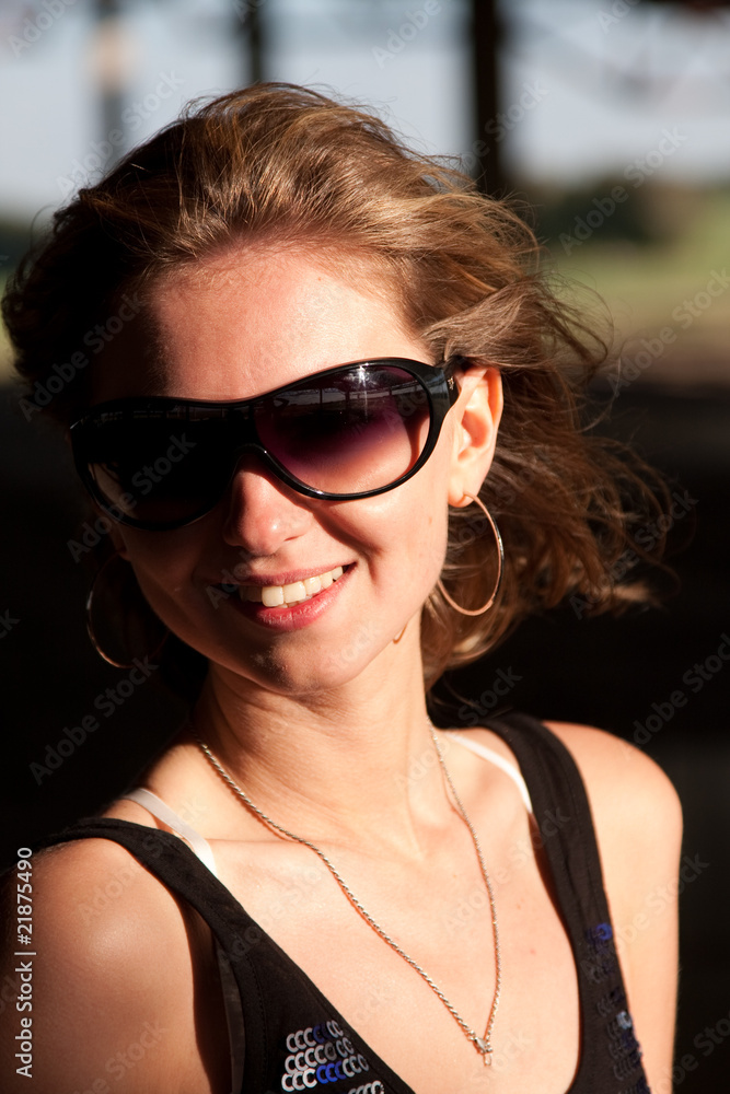 Young woman in sunglasses Young woman in sunglasses