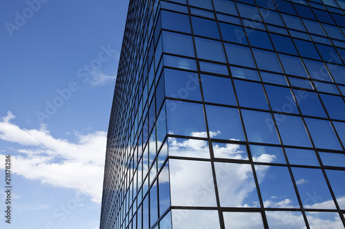 Corporate building, clouds reflection