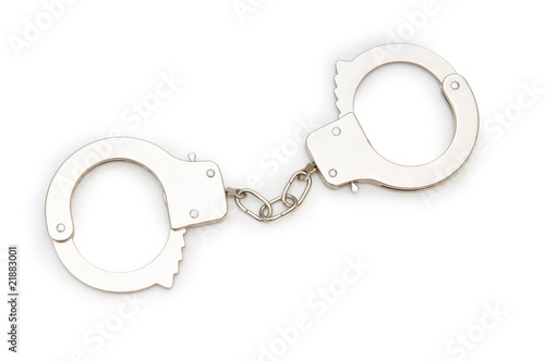 Metal handcuffs isolated on the white background