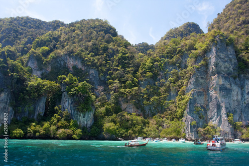 Green cliffs in the sea © Maygutyak