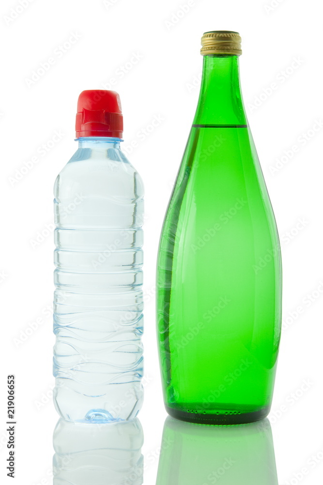 Bottles of mineral water reflected on white background Bottles of mineral water reflected on white background