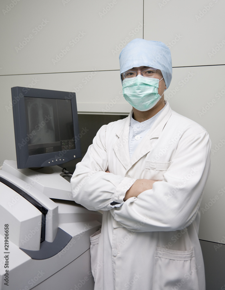 Fototapeta premium asian male doctor with computer