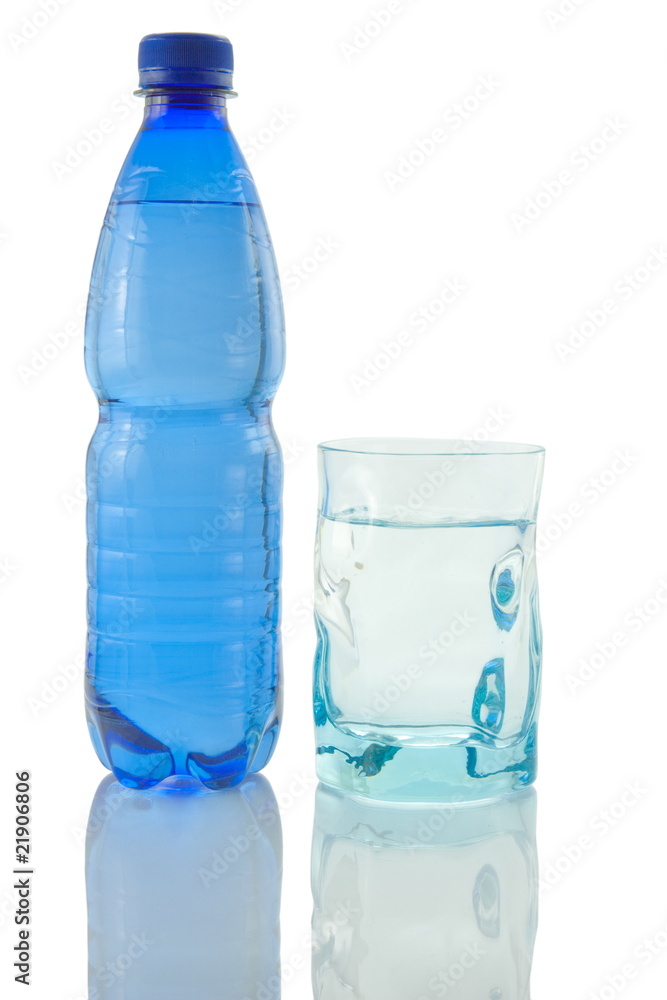 Bottle and glass of mineral water reflected on white background Bottle and glass of mineral water reflected on white background