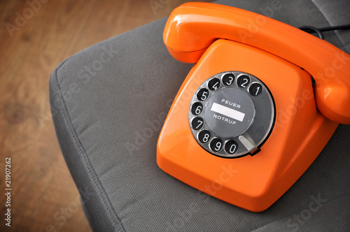 Orange retro telephone