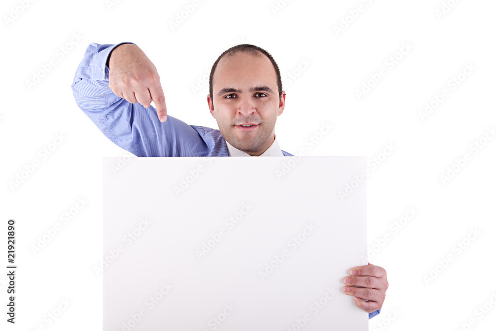 Young businessman holding a whiteboard and pointing Young businessman holding a whiteboard and pointing