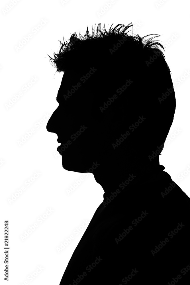 silhouette of a young man