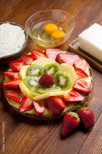 slice fruit cake with ingredients photo