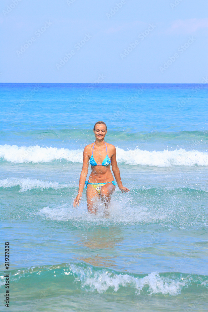 woman on the beach in Greece