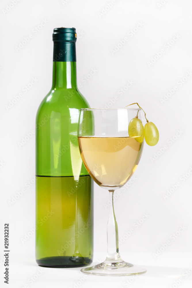 Glass of wine with grape