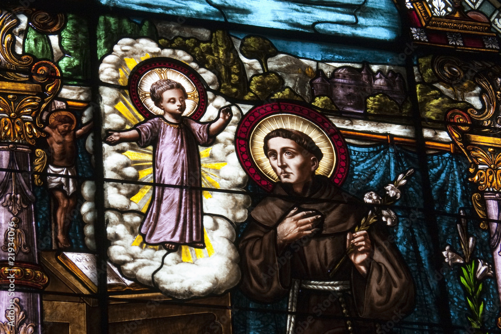 stain glass depicting angel and monk