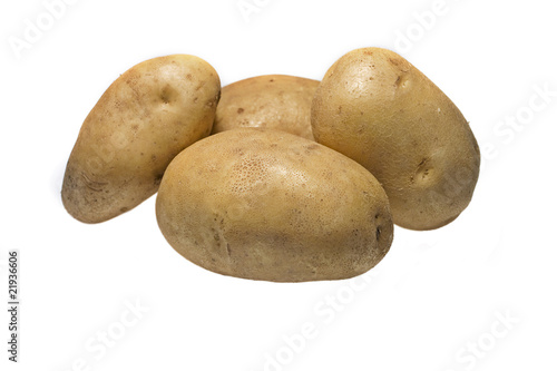 bunch of potatoes on white background