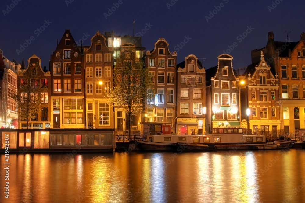 Amsterdam waterfront houses at night, The Netherlands