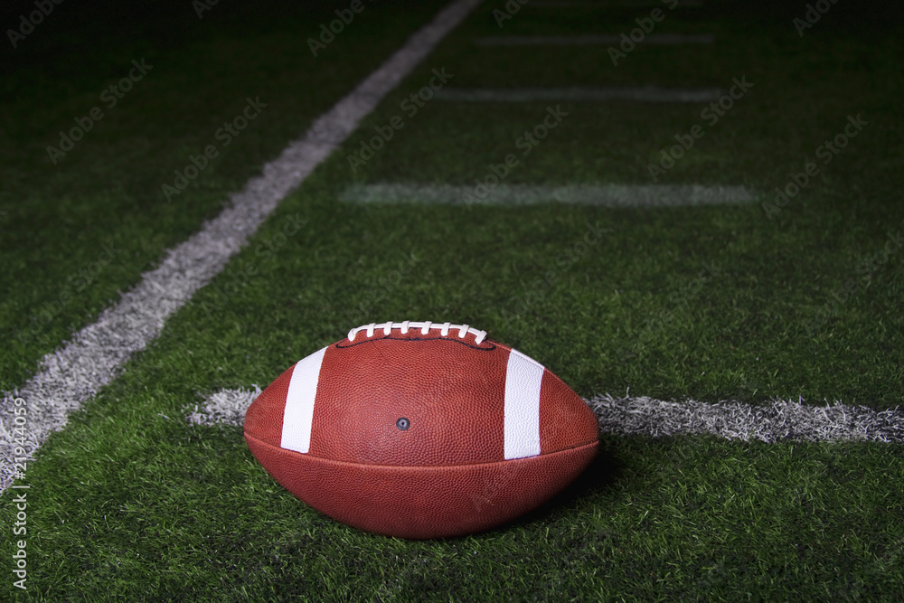 Obraz premium Football on a turf field