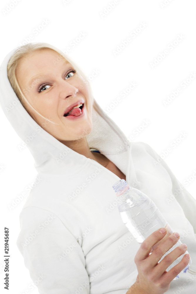 woman wearing a hooded sweatshirt and a water bottle in hand woman wearing a hooded sweatshirt and a water bottle in hand