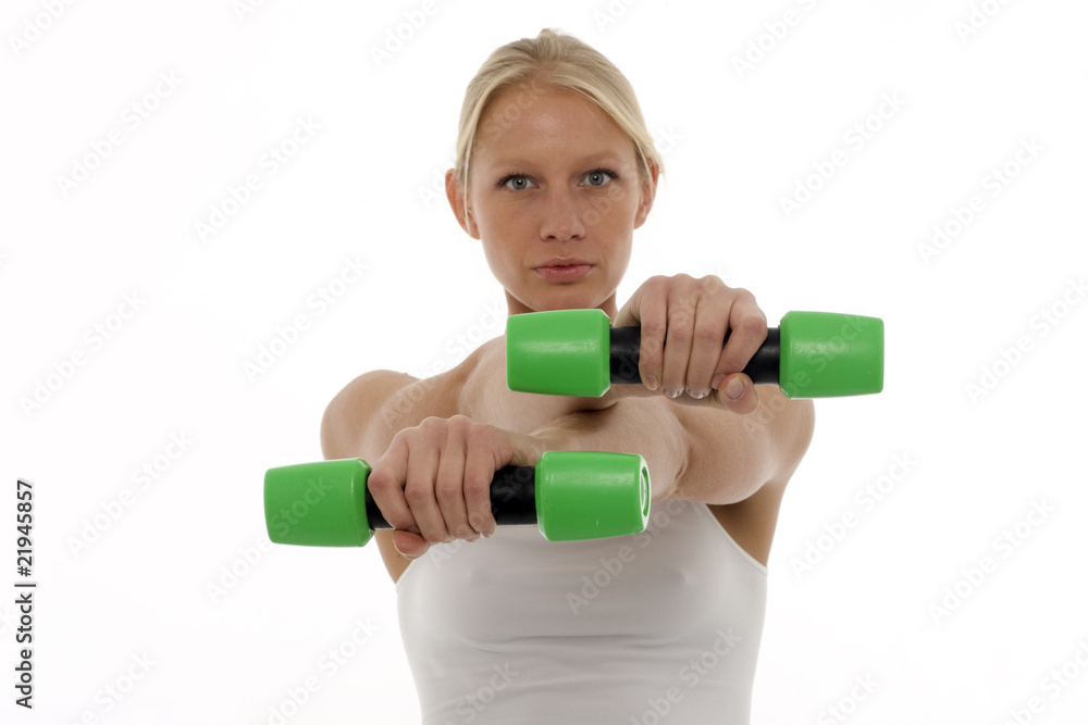 young caucasian woman who trains with dumbbells in hand young caucasian woman who trains with dumbbells in hand