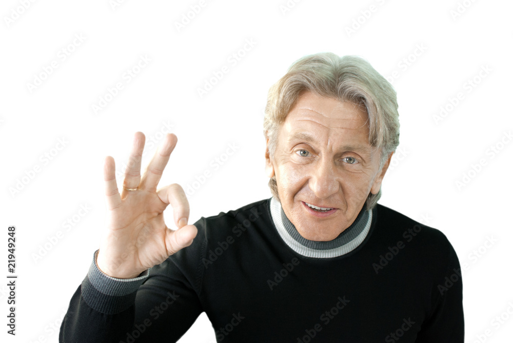 Senior shows OKAY sign isolated Senior shows OKAY sign isolated