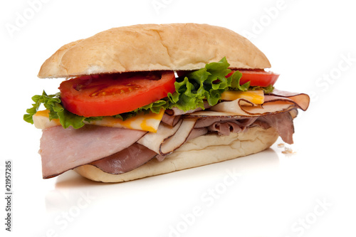 Ham and turkey sandwich on a hoagie bun on white