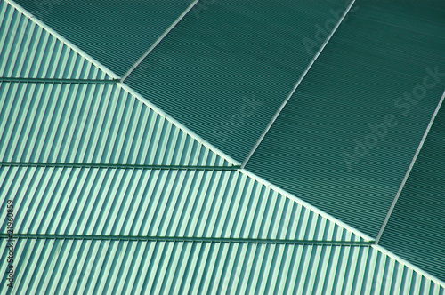 Background texture of a green conference center roof photo