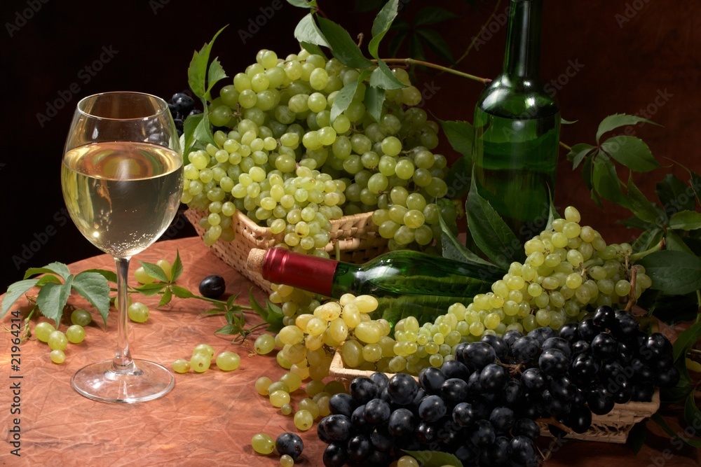 White dry wine, fresh clusters of a grapes