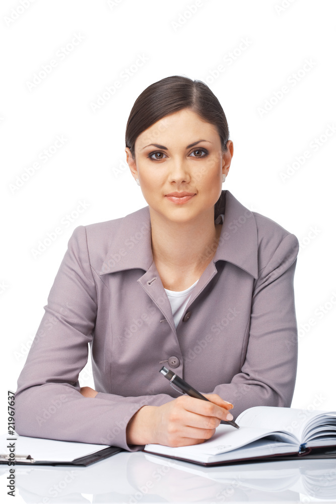 Businesswoman Writing In Her Diary. Businesswoman Writing In Her Diary.