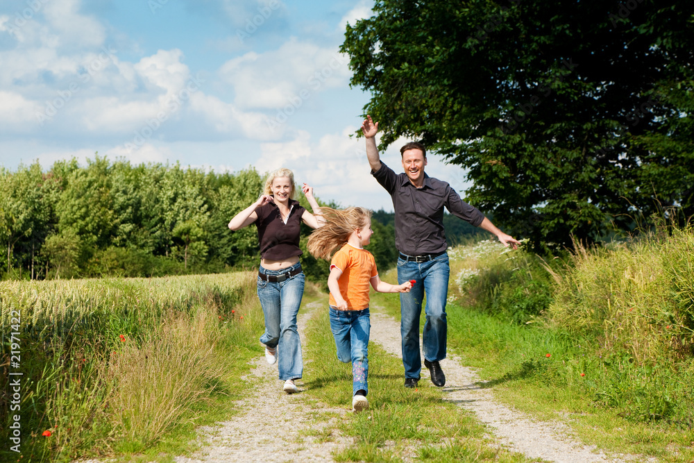 Fototapeta premium Family playing at a walk