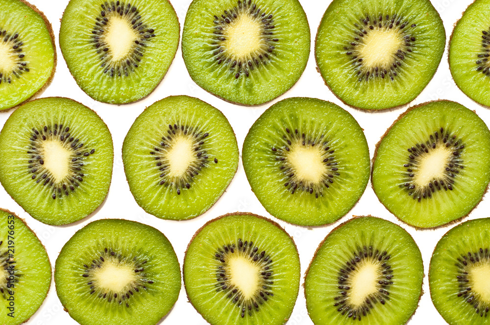 Fototapeta premium background made of kiwi slices isolated on white