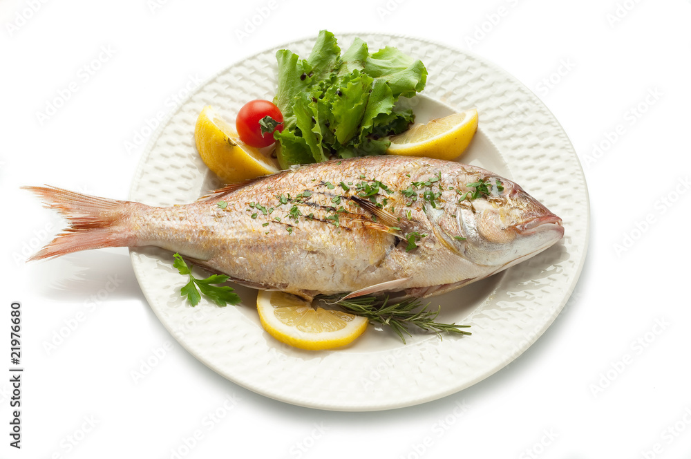 grilled red snapper with salad isolated on white grilled red snapper with salad isolated on white