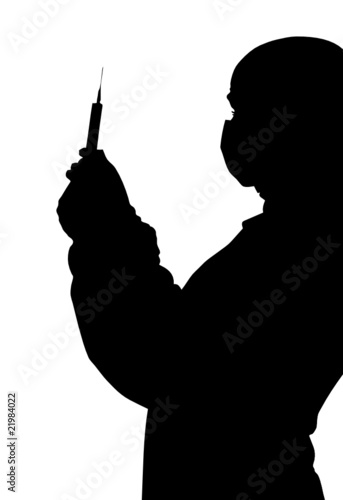 Silhouette of doctor with a syringe in his hand