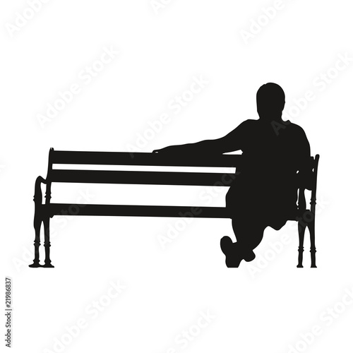 Silhouette homme sur un banc photo