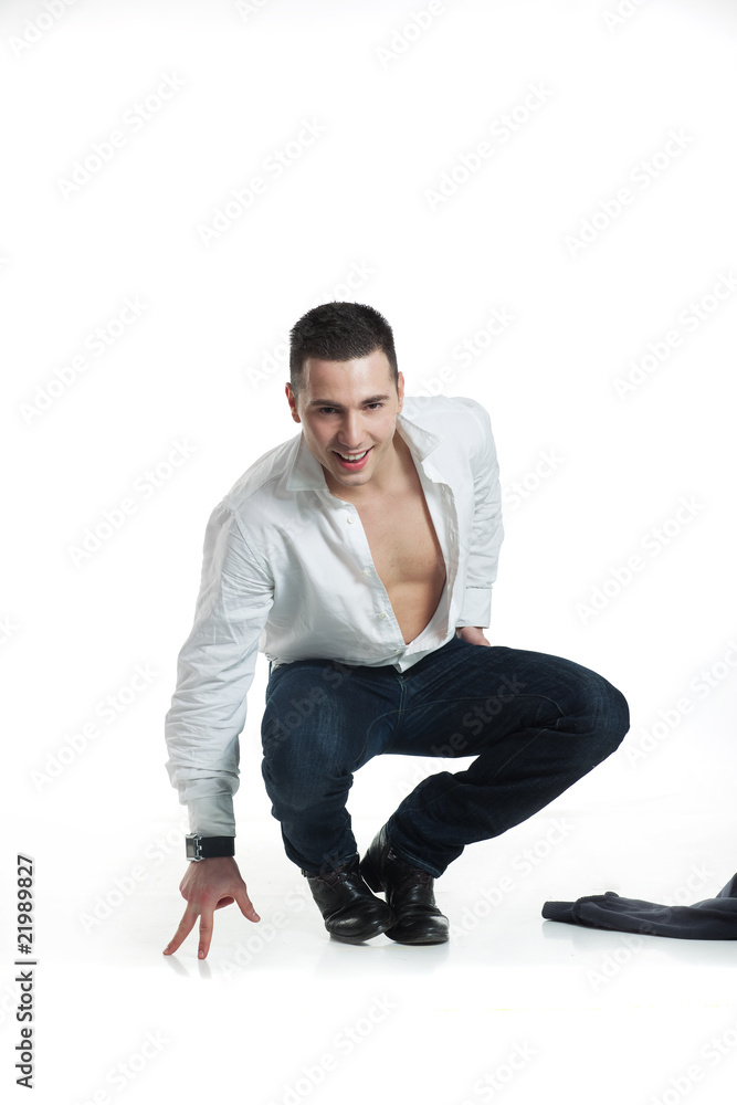 sexy crouching smiling man sexy crouching smiling man