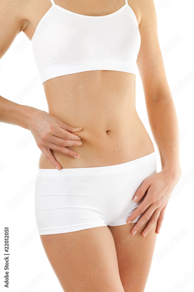 Fototapeta premium Slim woman isolated on white background