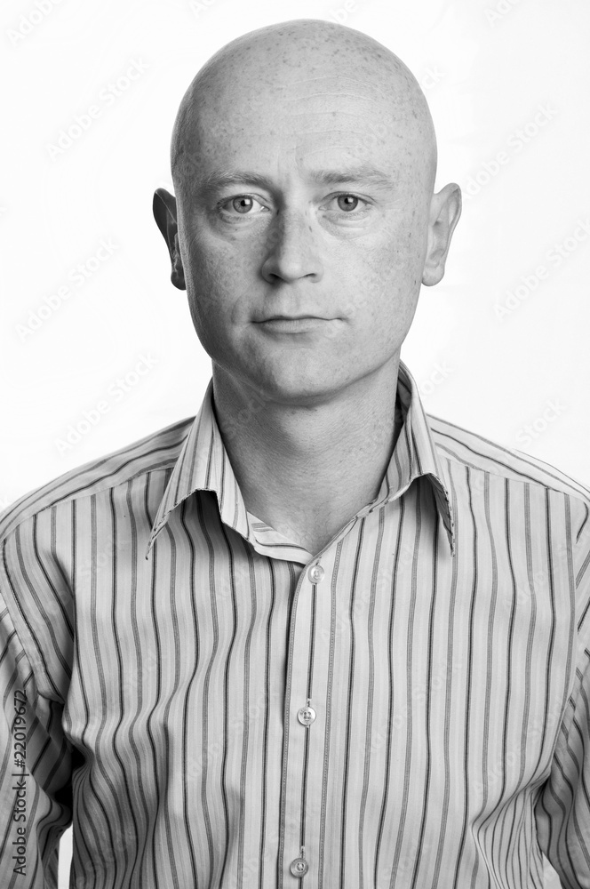 business man portrait in his 30's on white