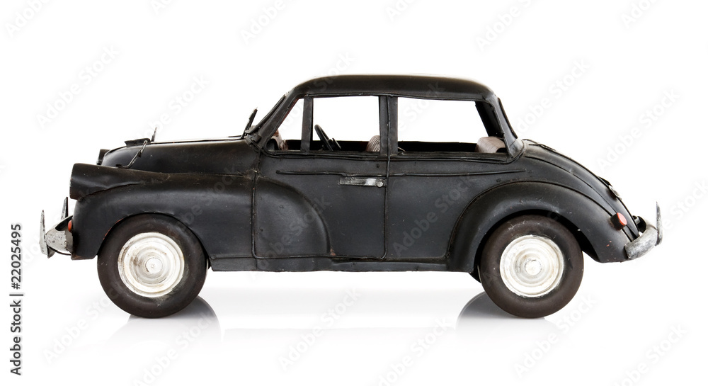 Classic english style toy car, isolated on white. Side view.