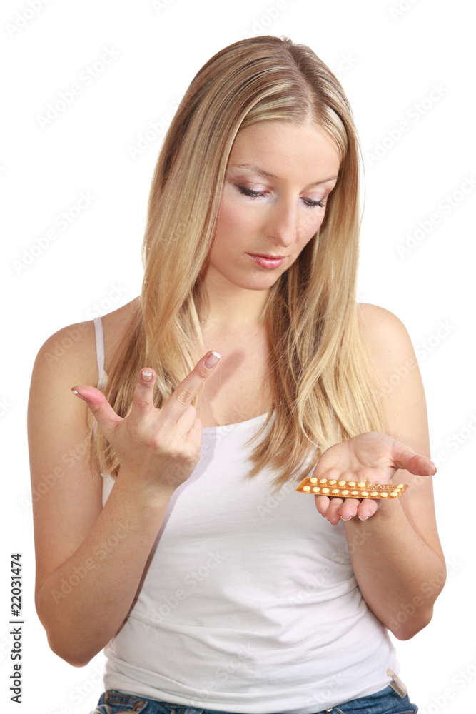 Naklejka premium Woman holding contraception pills